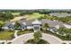 Beautiful clubhouse with manicured landscaping and golf course view at 2108 Antilles Club Dr, Kissimmee, FL 34747