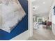 Hallway view of modern decor and open floor plan leading to living area and outdoor space at 2108 Antilles Club Dr, Kissimmee, FL 34747