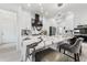 Modern kitchen with marble waterfall island, stainless steel appliances, and elegant lighting at 2108 Antilles Club Dr, Kissimmee, FL 34747