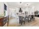 Beautiful kitchen with a marble waterfall island and contemporary finishes at 2108 Antilles Club Dr, Kissimmee, FL 34747
