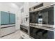 Sleek kitchen featuring stainless steel appliances and white cabinetry at 2108 Antilles Club Dr, Kissimmee, FL 34747