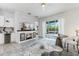 Cozy living room with fireplace, stylish decor, and sliding glass doors to the outdoor patio at 2108 Antilles Club Dr, Kissimmee, FL 34747