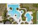 Aerial view of community pools, including a large pool, hot tub, and splash area at 2108 Antilles Club Dr, Kissimmee, FL 34747