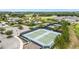 This image displays the tennis courts and other amenities at the community clubhouse at 2108 Antilles Club Dr, Kissimmee, FL 34747