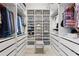 Spacious walk-in closet with custom shelving and drawers for optimal organization at 2108 Antilles Club Dr, Kissimmee, FL 34747