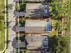 Aerial view of the property showing the house, pool, and surrounding neighborhood at 2115 Morning Star Drive, Clermont, FL 34714