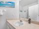 Bathroom featuring modern sink, mirror and ample vanity space at 2115 Morning Star Drive, Clermont, FL 34714