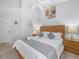 Spacious bedroom features vaulted ceilings, contemporary decor, and a comfortable queen-size bed at 2115 Morning Star Drive, Clermont, FL 34714