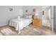 Comfortable bedroom featuring a queen-sized bed and simple decor at 2115 Morning Star Drive, Clermont, FL 34714