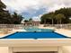 Community pool area with a blue billiard table. A place to relax and have fun at 2115 Morning Star Drive, Clermont, FL 34714