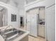 Bright kitchen with white appliances, tiled floors, and ample counter space at 2115 Morning Star Drive, Clermont, FL 34714