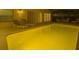 Enclosed swimming pool with lounge chairs and an outdoor dining set at 2115 Morning Star Drive, Clermont, FL 34714