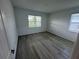 Bright bedroom with wood floors, offering a serene and inviting space at 2333 Daisy Tree Rd, St Cloud, FL 34771