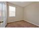 A standard bedroom with neutral carpet and a window letting in natural light at 3174 Grasmere View Pkwy, Kissimmee, FL 34746
