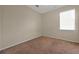 Standard bedroom with a window letting in natural light and neutral-toned walls at 3174 Grasmere View Pkwy, Kissimmee, FL 34746