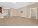 Spacious living room with tile flooring, neutral walls, and plenty of natural light at 3174 Grasmere View Pkwy, Kissimmee, FL 34746