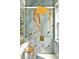 This luxurious shower has multiple shower heads and a rain shower feature for relaxation at 3174 Grasmere View Pkwy, Kissimmee, FL 34746