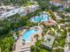 Expansive aerial view of resort amenities, including pools, lush landscaping, and dining areas at 4013 Breakview Dr # A407, Orlando, FL 32819