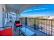 Outdoor balcony with a glass table and seating, overlooking community views at 4013 Breakview Dr # A407, Orlando, FL 32819