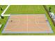 Aerial view of a community basketball court with well-maintained surface and surrounded by greenery at 4078 Old Mill Rd, Haines City, FL 33844