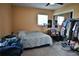 View of secondary bedroom featuring a bed and mirrored closet at 410 5Th S St, Dundee, FL 33838