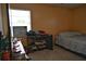 Cozy bedroom features a window and bed in natural light at 410 5Th S St, Dundee, FL 33838