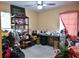 Office area featuring a large workspace and natural light, perfect for productivity and creativity at 410 5Th S St, Dundee, FL 33838