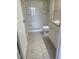Well-lit bathroom featuring a shower, toilet, and vanity with granite countertops at 417 Southern Pecan Cir # 201, Winter Garden, FL 34787