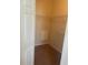 Organized walk-in closet with ample shelving and storage space, ensuring everything has its place at 417 Southern Pecan Cir # 201, Winter Garden, FL 34787