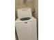 Convenient laundry room with a modern washing machine at 417 Southern Pecan Cir # 201, Winter Garden, FL 34787