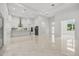 Spacious living room showcasing open floor plan and modern kitchen design at 4528 Yorkshire Ln, Kissimmee, FL 34758