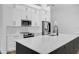 Bright kitchen featuring white countertops, cabinets, and stainless steel appliances at 460 W Palm Valley Dr, Oviedo, FL 32765