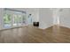Spacious living room with hardwood floors, ample natural light, and modern finishes at 460 W Palm Valley Dr, Oviedo, FL 32765