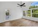 Airy living space with natural light, high ceilings, backyard views, and modern finishes at 460 W Palm Valley Dr, Oviedo, FL 32765