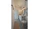 Modern bathroom with double sinks, neutral colors, matte black fixtures, and glass enclosed shower at 5110 Sw 158Th St, Ocala, FL 34473