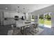 Open floor plan with view to the kitchen and dining room table at 5110 Sw 158Th St, Ocala, FL 34473