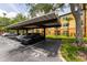 Convenient covered carport parking with reserved spaces near the building in a well maintained community at 5447 Vineland Rd # 1308, Orlando, FL 32811