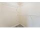Spacious walk-in closet with wire shelving, providing ample storage for clothes and accessories at 5447 Vineland Rd # 1308, Orlando, FL 32811