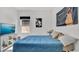 Serene bedroom with a view and TV, offering a calming and comfortable space to relax at 5857 Beefmaster Rd, St Cloud, FL 34771