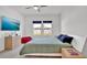 Cozy bedroom offering a serene place to relax and unwind with a large TV at 5857 Beefmaster Rd, St Cloud, FL 34771