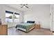 Bedroom with natural light, sleek furnishings, and light wood flooring at 5857 Beefmaster Rd, St Cloud, FL 34771