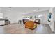 Expansive open-concept living area blending kitchen, dining, and seating for seamless entertainment at 5857 Beefmaster Rd, St Cloud, FL 34771