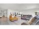 Spacious open living area with modern stainless steel appliances in the kitchen at 5857 Beefmaster Rd, St Cloud, FL 34771