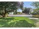 Spacious backyard with a new fence, offering privacy and room for outdoor activities at 606 Faber Dr, Orlando, FL 32822