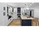 Well-appointed kitchen with island, modern cabinetry, and stainless steel appliances at 606 Faber Dr, Orlando, FL 32822