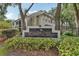 Community sign for Central Park Condominiums with lush greenery in the foreground at 6088 Westgate Dr # 201, Orlando, FL 32835