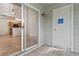View from patio into kitchen with modern appliances, blending indoor and outdoor living with ease at 6088 Westgate Dr # 201, Orlando, FL 32835
