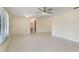 Living room with tiled floors and a ceiling fan at 622 N Goodrich Dr, Deltona, FL 32725