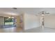 Open living area with tiled floors and sliding glass doors at 622 N Goodrich Dr, Deltona, FL 32725