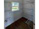 Bright pantry featuring wire shelving and a window for natural light at 6741 Heavitree Dr, Sebring, FL 33876